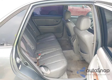 2000 Toyota Avalon Xls z USA, uszkodzony, nr VIN 4T1BF28BXYU013685